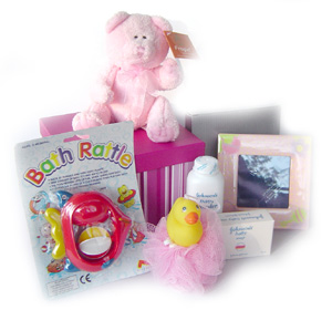 �Baby Hamper consisiting of Oil,soap,shampoo,towel,socks, dress,diapers�